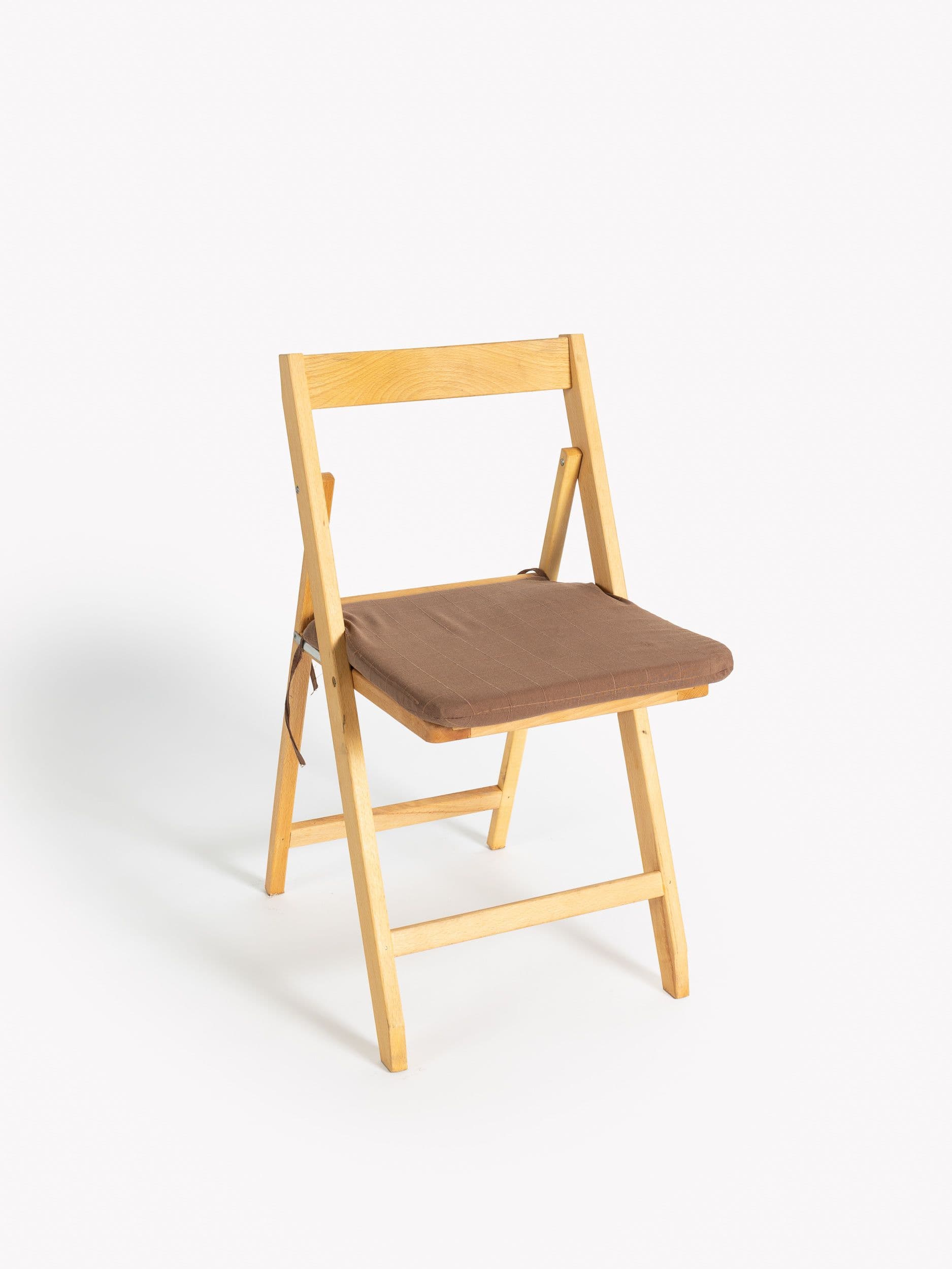 Coixí marró per a cadira plegable